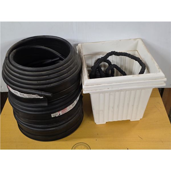 Planters, hose and grass edging