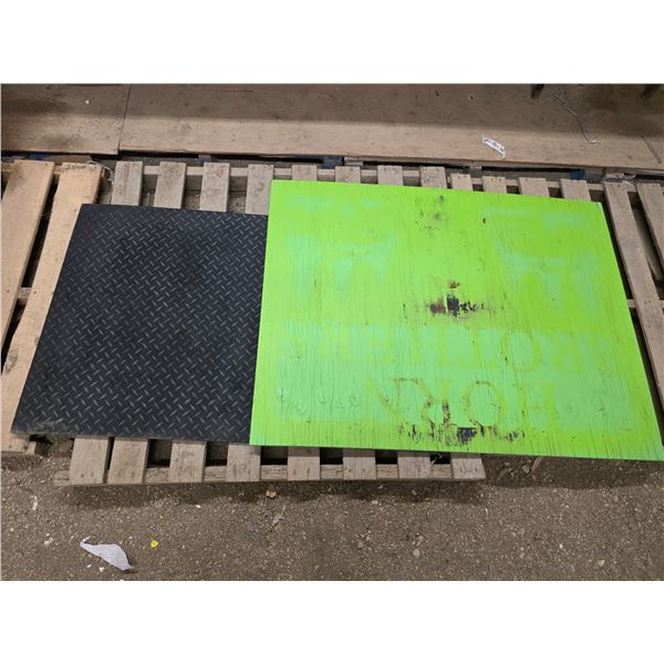Rubber mat and piece of plywood