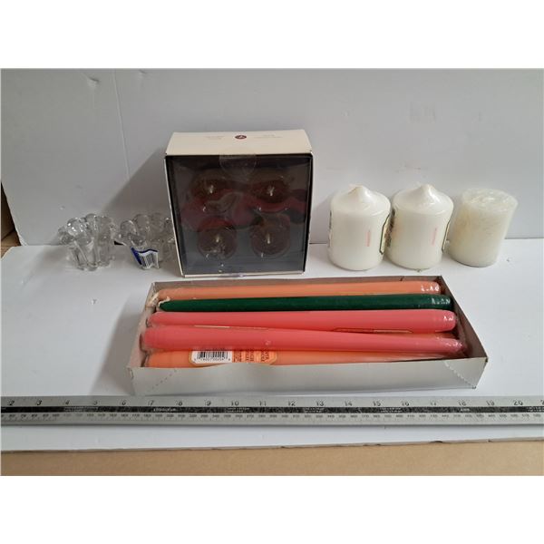 "glass candle holders + and assorted candles"