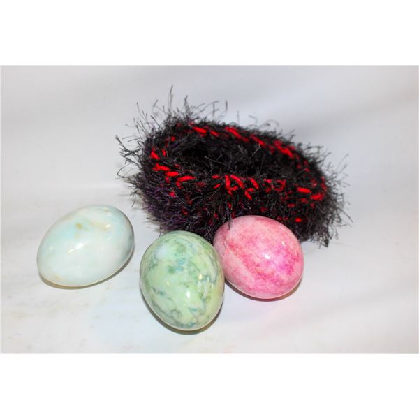 LOT OF THREE ROCK/GEM EGGS IN NEST EGGS ARE 3.5 IN