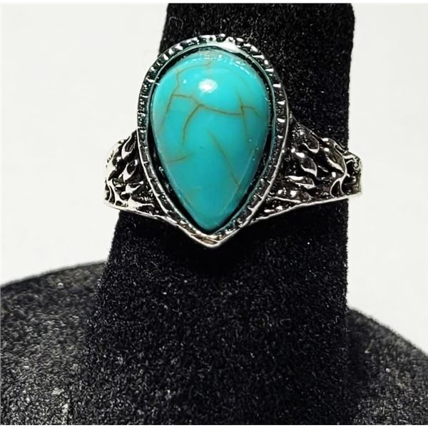 25)  PEAR SHAPED, BEZEL SET TURQUOISE RING,