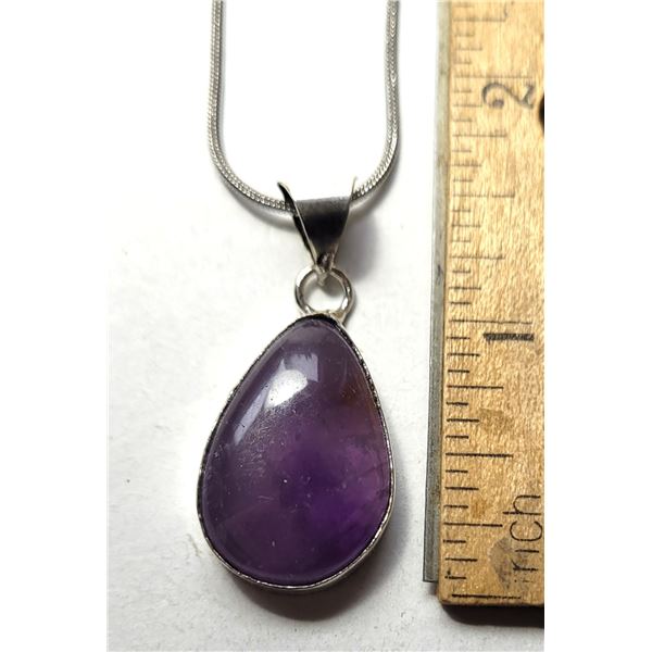 28)  BEZEL SET NATURAL AMETHYST PENDANT