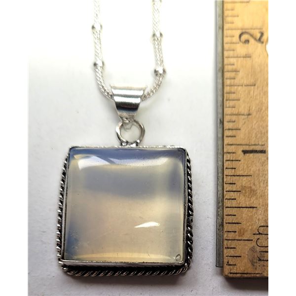 29)  SQUARE CUT NATURAL OPALINE PENDANT