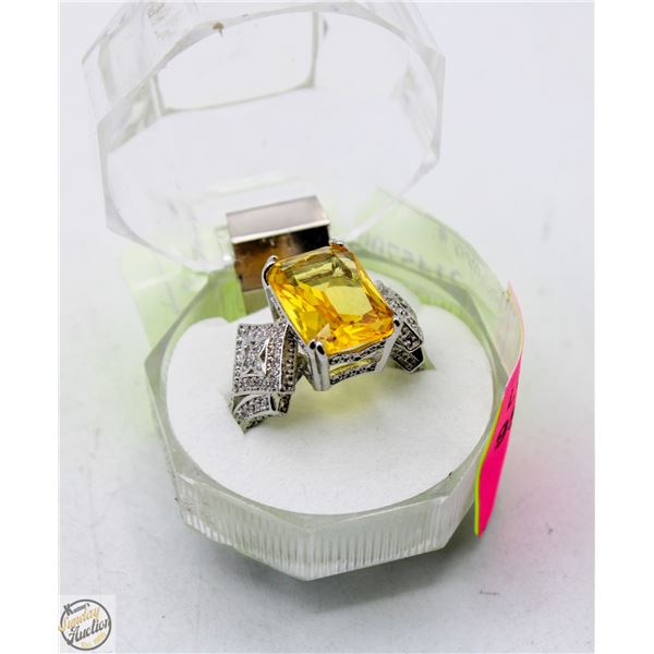 SILVER RING WITH YELLOW STONE