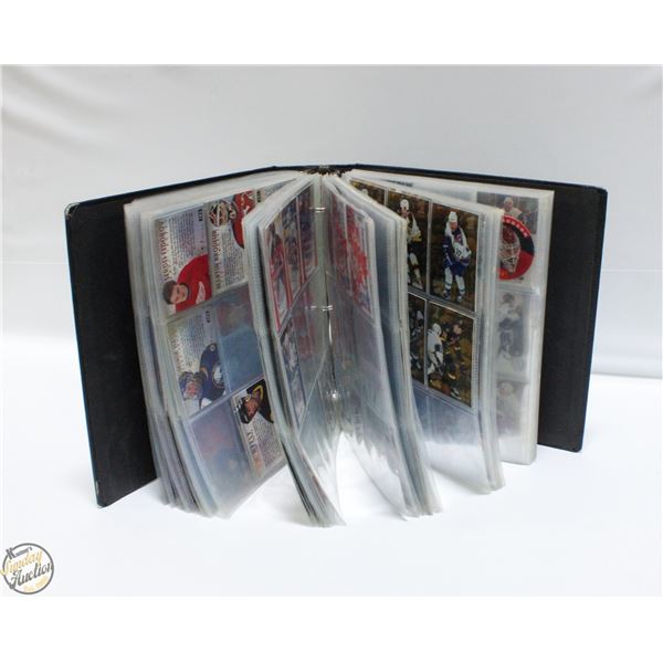 BINDER OF ASSORTED HOCKEY CARDS