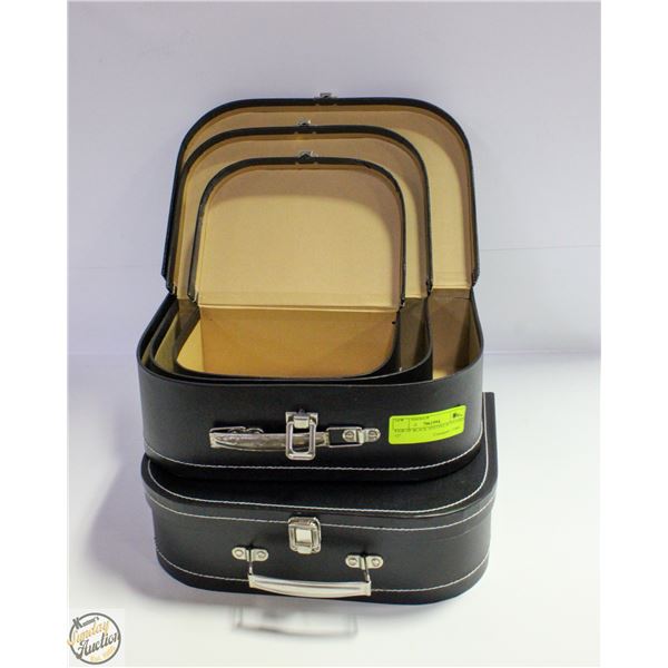 PAIR OF BLACK NESTING SUITCASES 12"