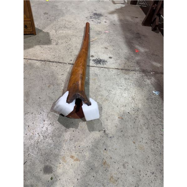 Decorative wood approximately 56 inches long