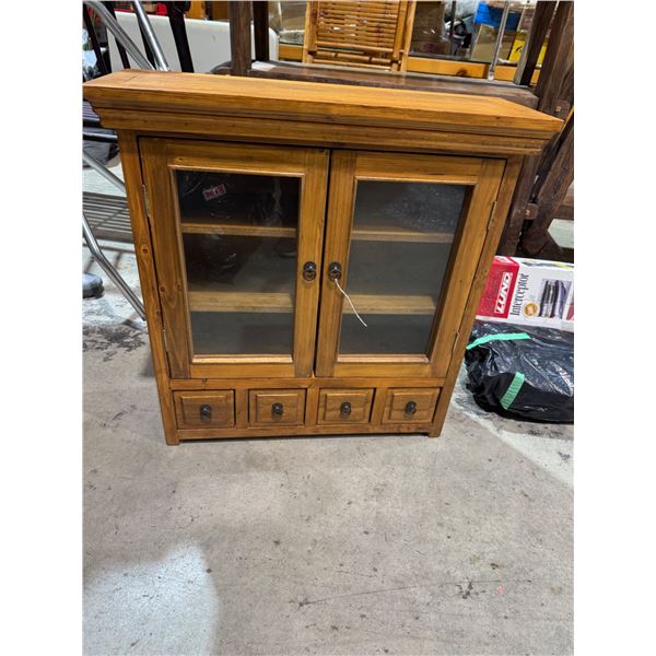 Cabinet measures 27 1/2" x 10" x 28 1/2" tall