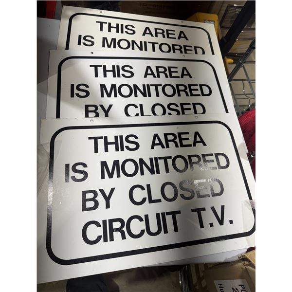 This area is monitored signs