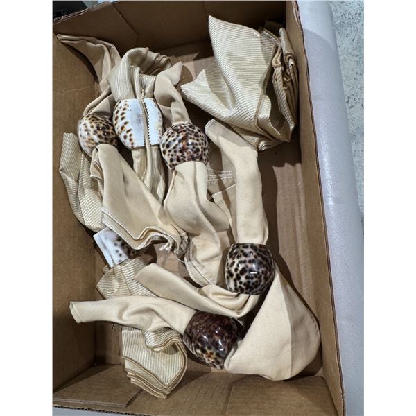 Napkins and shell napkin holders