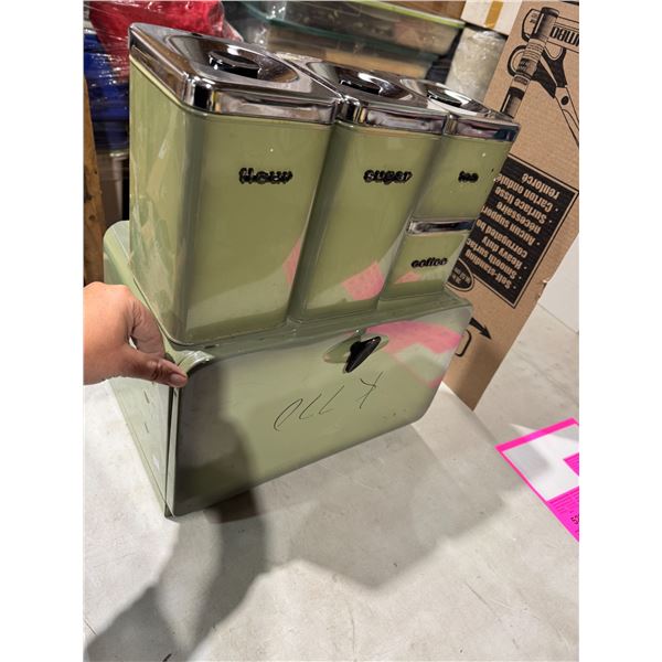 The queen line made in Canada Vintage canister and Redbox set