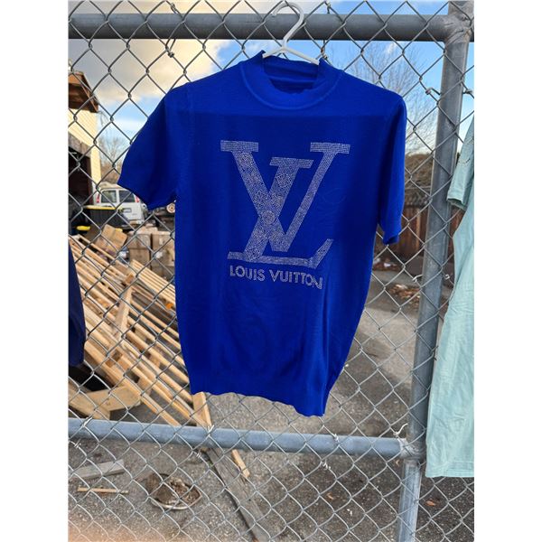 Louis Vuitton shirt so it's not shown authenticity up to buyer to verify before