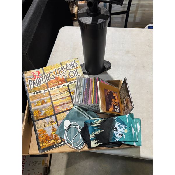 Painting, Lessons in oil, CDs, socks, charger, and pump