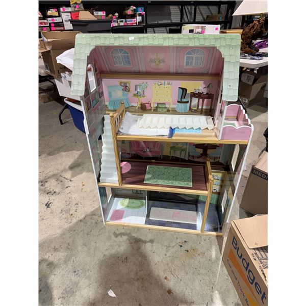 Dollhouse approximately 4 feet tall