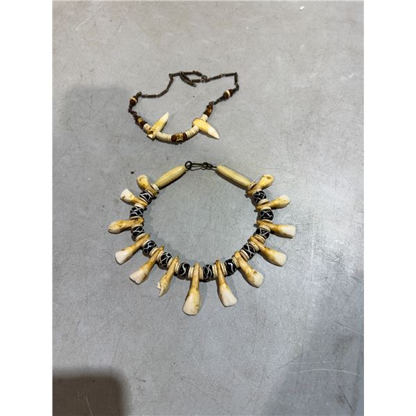 Tribal necklaces with buffalo? Teeth.