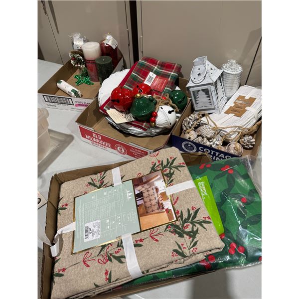 Candles, napkins, bells, plates, and tablecloths