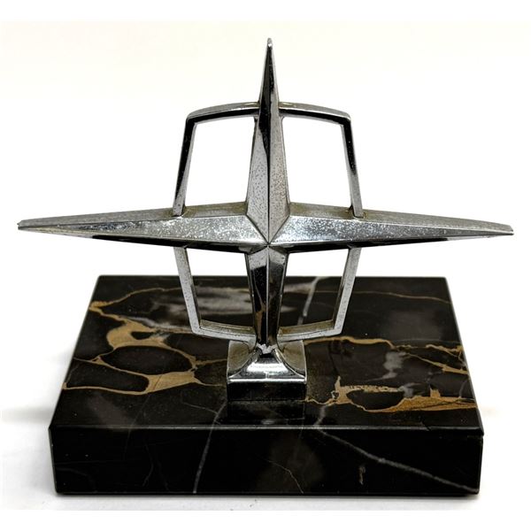 1960s Lincoln Continental Hood Ornament on Marble