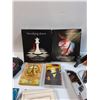 Image 3 : Lot: Change/Coin Purses, Breaking Dawn & New Moon Audio Books, Make-up Mirror, Avon Watch, Misc