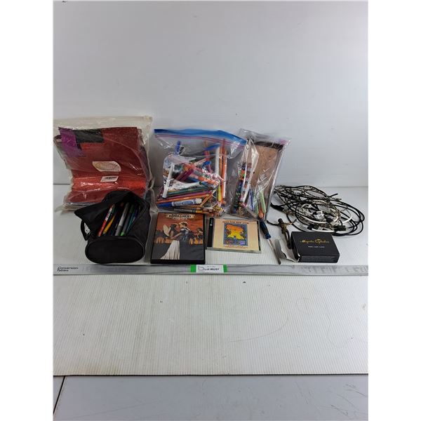 (2) Bags of Pens,Pencils,Crayons,Markers,DVD,CD,Pkg. of Colored Sparkling Paper and misc.
