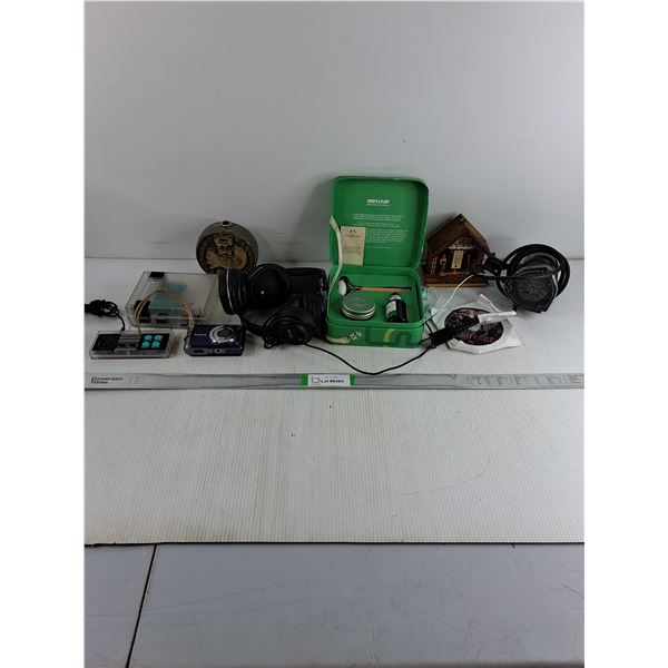 Body Shop Gift Pack,Vintage Thermometer,Canon Digital Camera,Headphones and more in pictures