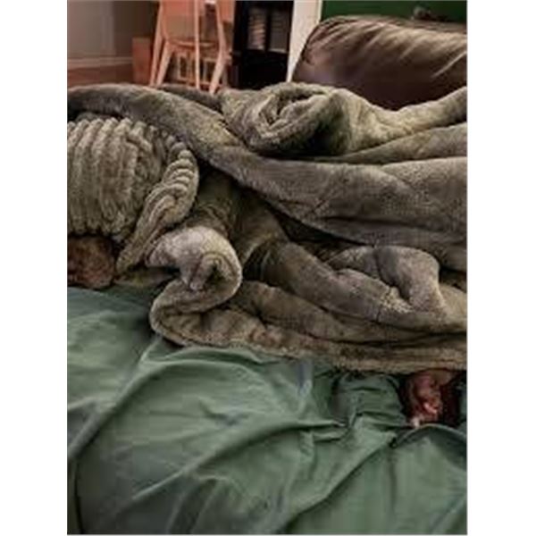 Green Plush Blanket With Folded Fabric and Tag