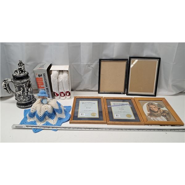 6 picture frames, golf club covers, large beer stein, doll