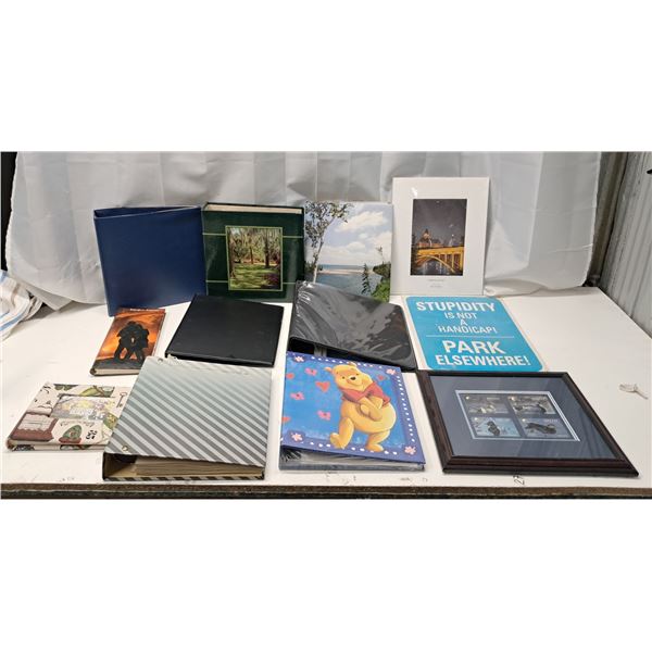 6 photo albums, 3 binders, 1 fram, sign, art piece