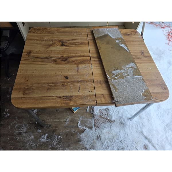 Table with leaf- 60" by 36" by 29"H