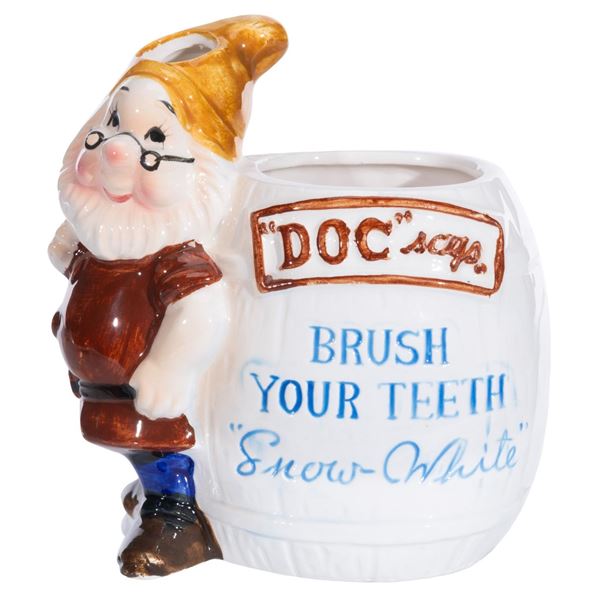 A Doc "Brush Your Teeth" Ceramic Toothbrush Holder.