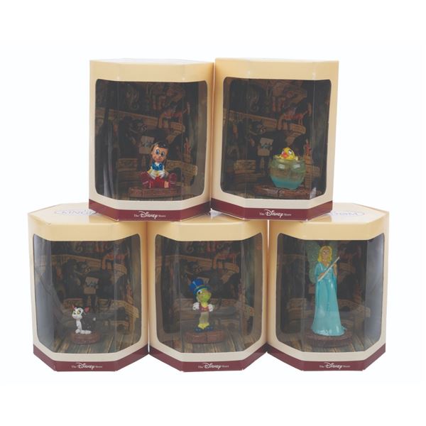 A "Pinocchio" Tiny Kingdom Figurine Collection.