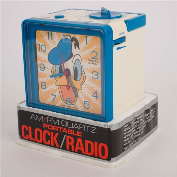 A Donald Duck AM/FM Alarm Clock Radio.