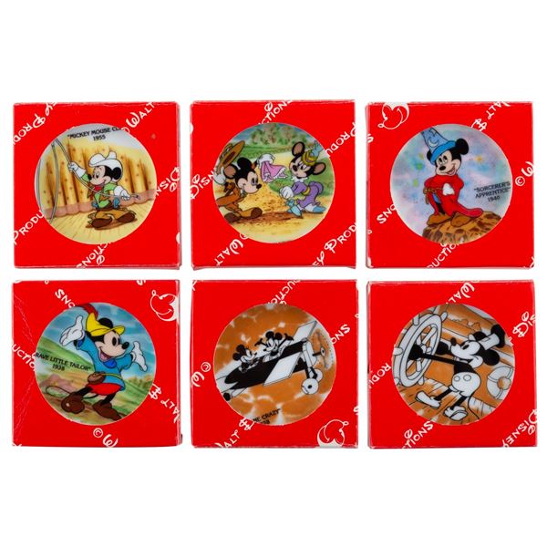 A Set of Mickey Through the Years Mini Souvenir Plates.