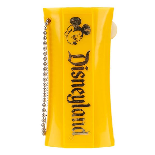 A Disneyland Yellow Keychain Flashlight.
