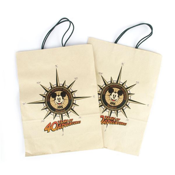 A Pair of "40 Years of Adventure" Mickey Shopping Bags.