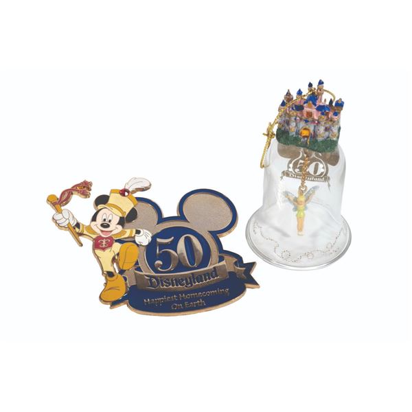 A Disneyland 50th Anniversary Bell and Lanyard Badge.