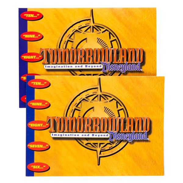 A Pair of New Tomorrowland Grand Opening Pop-Up Invitations.