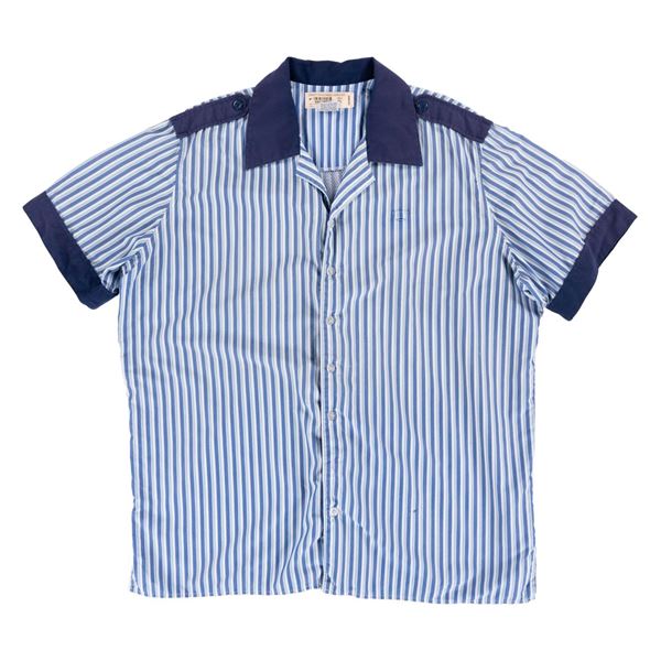 An Epcot Center Cast Member Shirt.