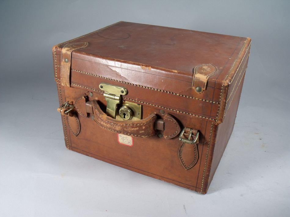 A Vintage Leather and Brass Hat Box.