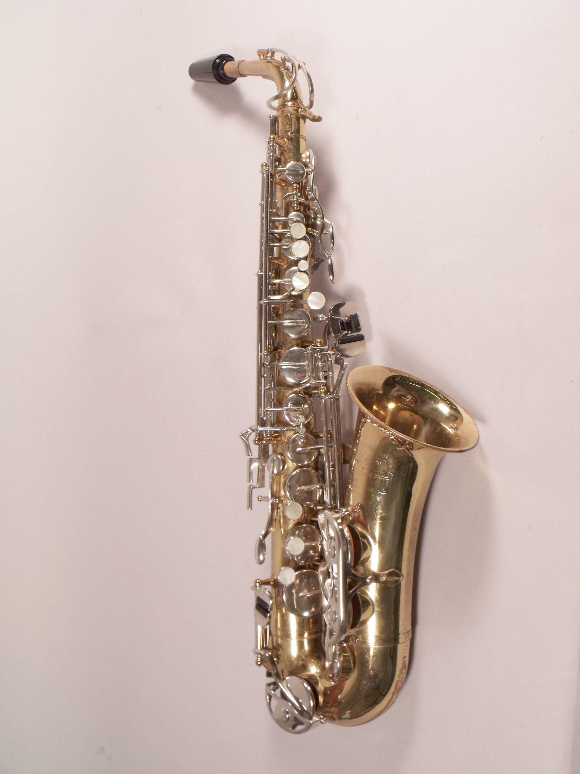 A Selmer Bundy II Brass and Chrome Alto Saxophone,