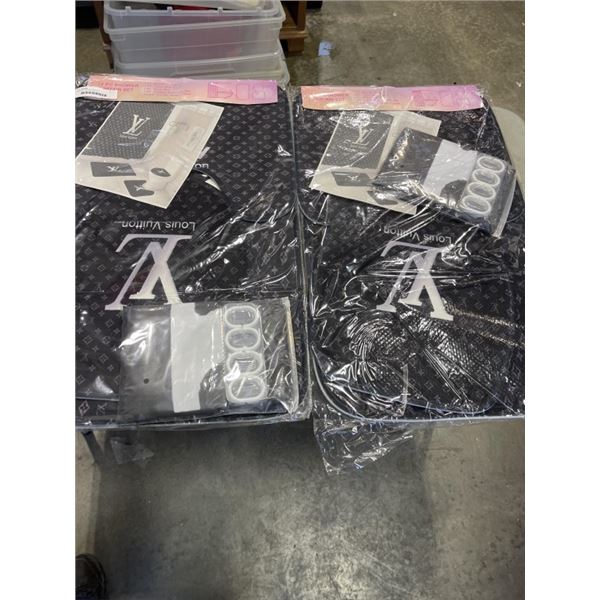 2 NEW 'LV' BATHROOM SETS