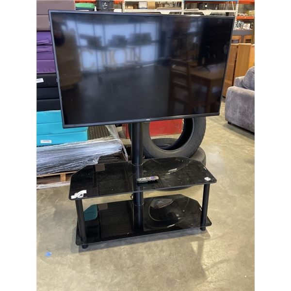 GLASS TV STAND W/ TV AND REMOTE