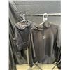 Image 1 : 2 NEW LADIES SIZE MEDIUM SWEATERS - UNDER ARMOUR AND PUMA