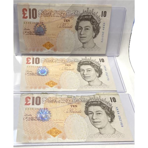 Quantity of Three , Ten Pound Bills ,