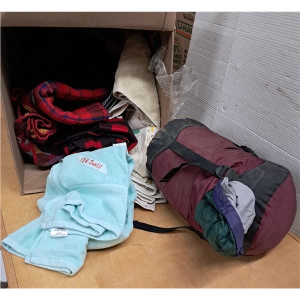 sleeping bag + fleece blankets/towels