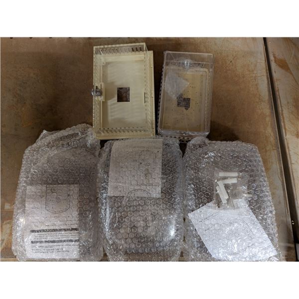 Lot of Thermostat Guards in original Boxes