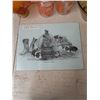 Image 2 : cutting board + kitchen dishes