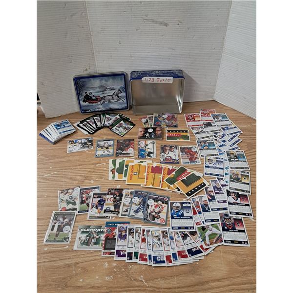 tin container + sport cards