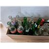Image 2 : pop and liquer bottles