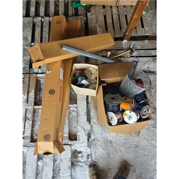 Pallet of wire spools and racks to store them- might not be complete