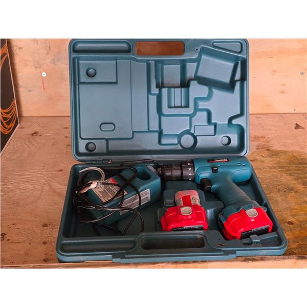 Makita drill with batteries and charger